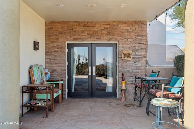 doorway to property featuring french doors