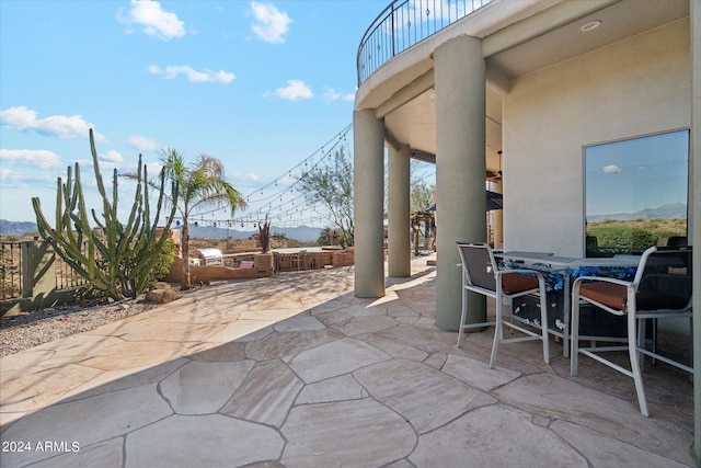 view of patio / terrace with a balcony