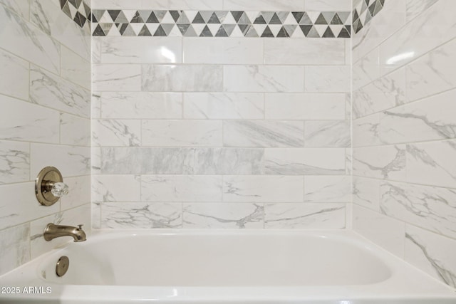 bathroom featuring shower / washtub combination