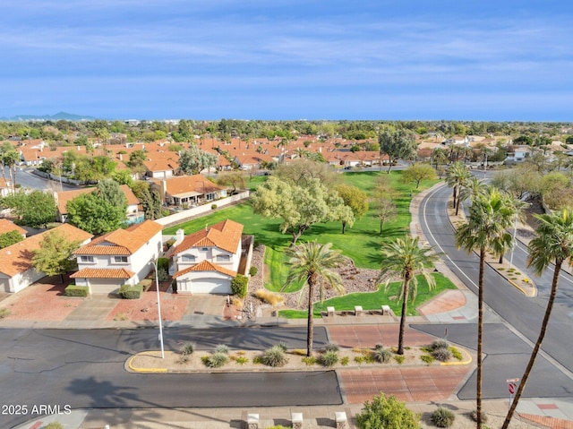 birds eye view of property with a residential view