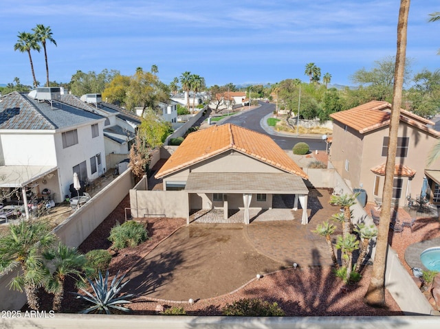 birds eye view of property with a residential view