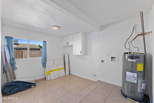 6714 N 26th Dr, Phoenix, AZ 85017 - clothes washing area with light tile patterned floors, washer hookup, hookup for an electric dryer, water heater, and cabinet space