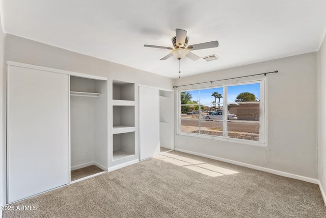 6714 N 26th Dr, Phoenix, AZ 85017 - unfurnished bedroom featuring visible vents, baseboards, ceiling fan, and carpet