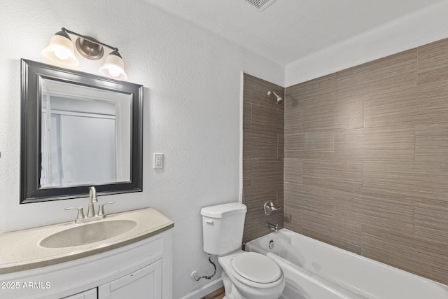 6714 N 26th Dr, Phoenix, AZ 85017 - bathroom featuring washtub / shower combination, toilet, and vanity