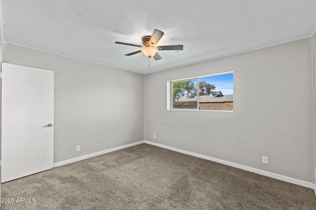 6714 N 26th Dr, Phoenix, AZ 85017 - empty room featuring baseboards, a ceiling fan, and carpet floors