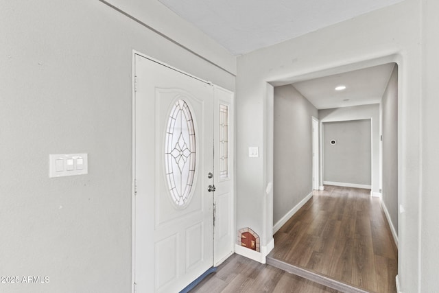 6714 N 26th Dr, Phoenix, AZ 85017 - foyer entrance featuring baseboards and wood finished floors
