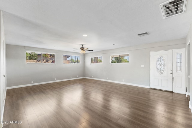 6714 N 26th Dr, Phoenix, AZ 85017 - interior space featuring dark wood-type flooring, a ceiling fan, and visible vents