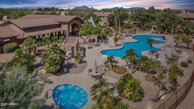 11500 E Cochise Dr Unit 1015, Scottsdale, AZ 85259 - aerial view at dusk featuring a mountain view