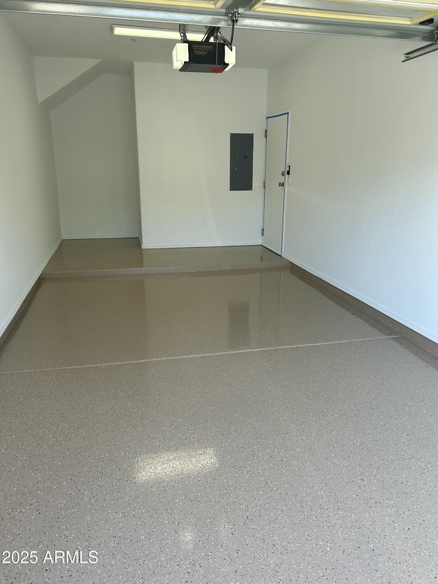 11500 E Cochise Dr Unit 1015, Scottsdale, AZ 85259 - garage with baseboards, a garage door opener, and electric panel