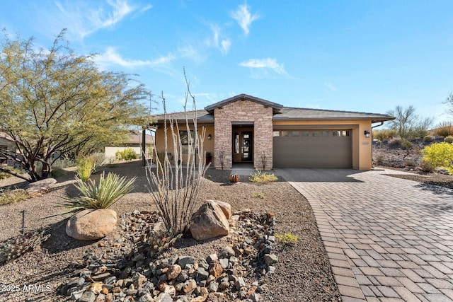 view of front of home with a garage