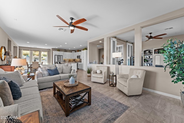 living room featuring ceiling fan