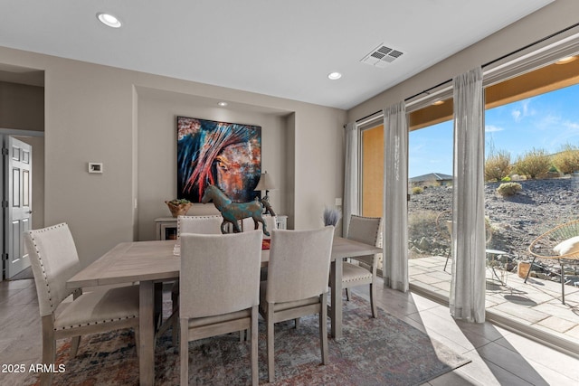 dining room with tile patterned flooring