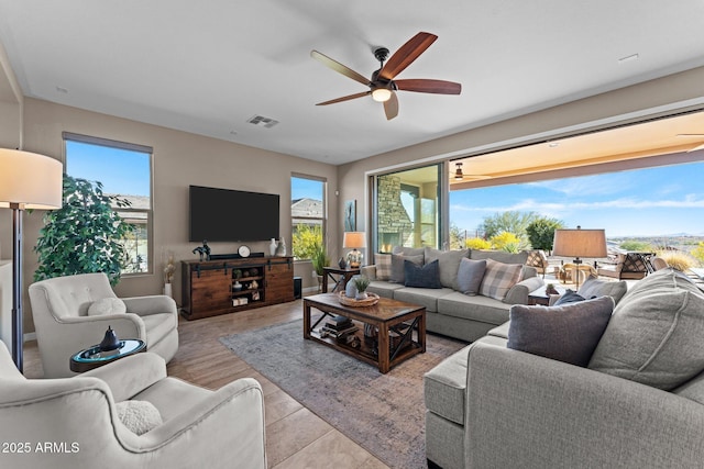 living room with ceiling fan