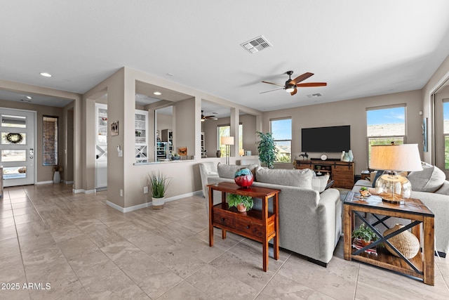 living room featuring ceiling fan