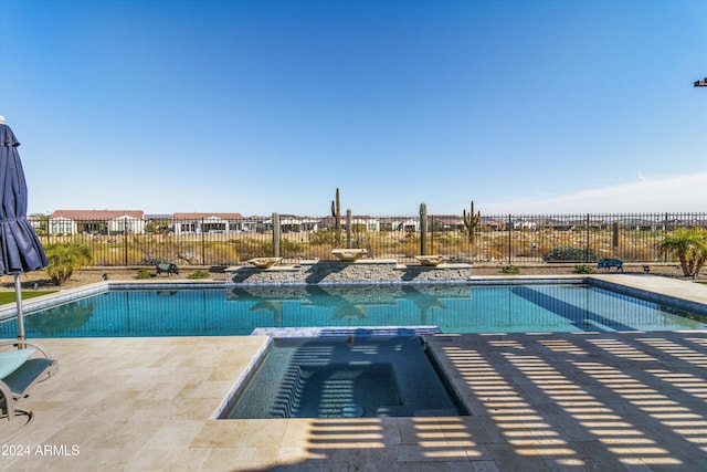 view of swimming pool featuring a patio