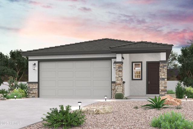 17294 W Paraiso Ln, Surprise, AZ 85387 - prairie-style home featuring stone siding, driveway, stucco siding, and a garage