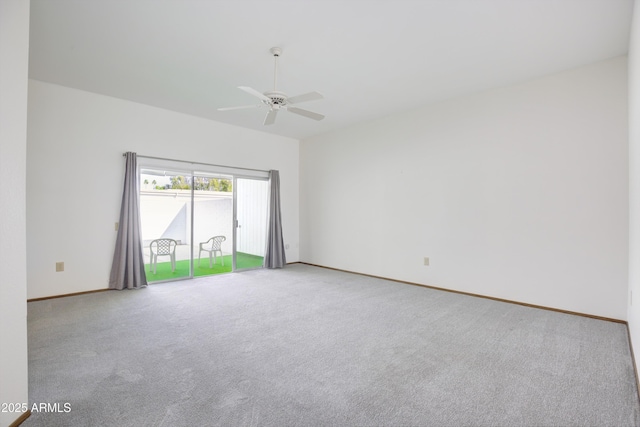 empty room featuring ceiling fan and carpet flooring