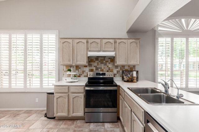 23756 S Vacation Way, Sun Lakes, AZ 85248 - kitchen featuring appliances with stainless steel finishes, under cabinet range hood, a sink, light countertops, and plenty of natural light