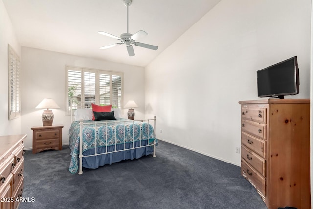 23756 S Vacation Way, Sun Lakes, AZ 85248 - bedroom with dark carpet, vaulted ceiling, a ceiling fan, and baseboards