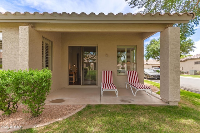 23756 S Vacation Way, Sun Lakes, AZ 85248 - doorway to property with stucco siding