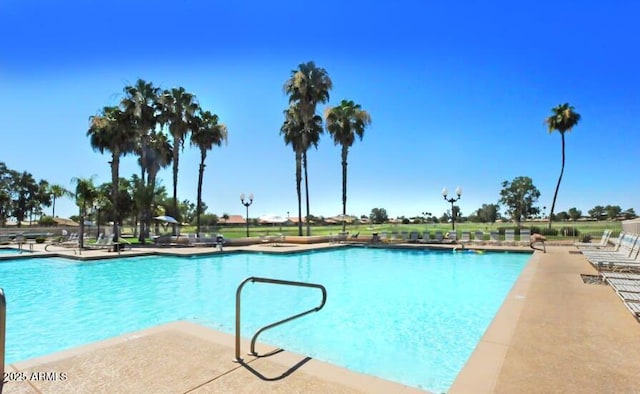 23756 S Vacation Way, Sun Lakes, AZ 85248 - community pool with a patio area