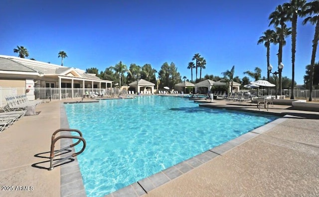 23756 S Vacation Way, Sun Lakes, AZ 85248 - community pool with a patio