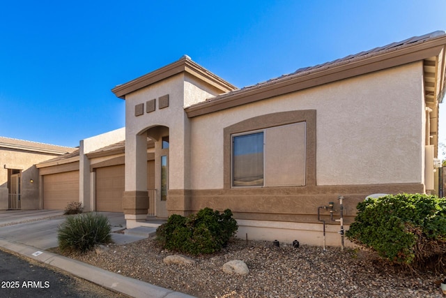 view of front of home with a garage