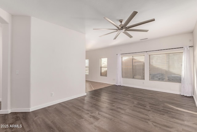 unfurnished room with ceiling fan and dark hardwood / wood-style floors