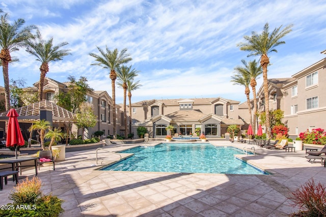 view of pool featuring a patio