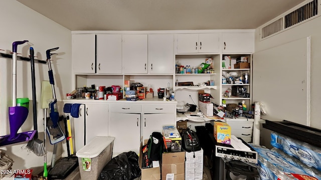 kitchen with white cabinetry