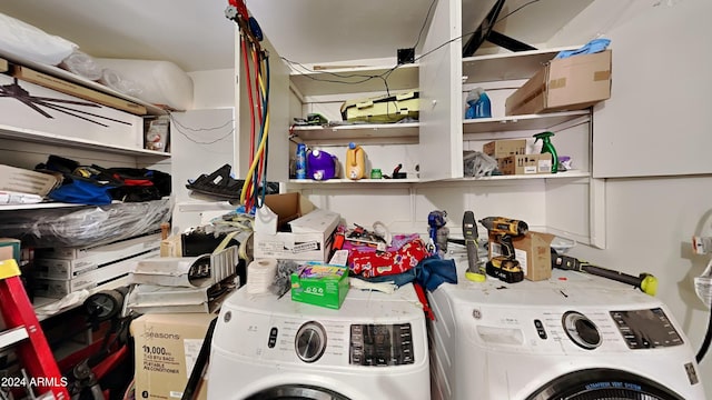 washroom with washing machine and dryer