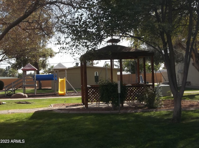 view of play area featuring a gazebo and a yard