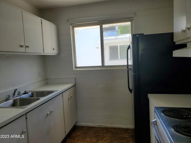 kitchen with sink and white cabinetry