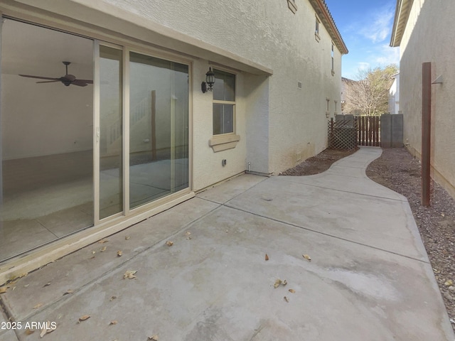 view of patio / terrace featuring ceiling fan