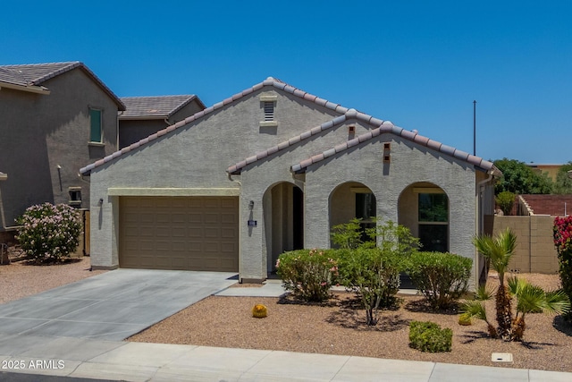 898 E Ladbroke Way, Gilbert, AZ 85297 - view of front facade featuring an attached garage, driveway, a tiled roof, and stucco siding
