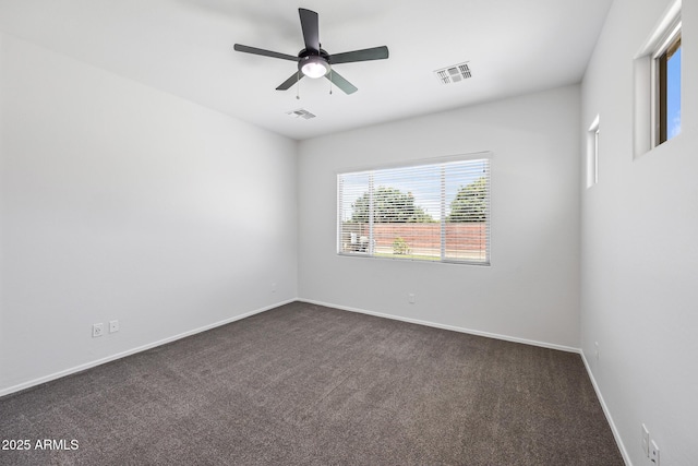 898 E Ladbroke Way, Gilbert, AZ 85297 - spare room featuring dark colored carpet, a ceiling fan, and baseboards