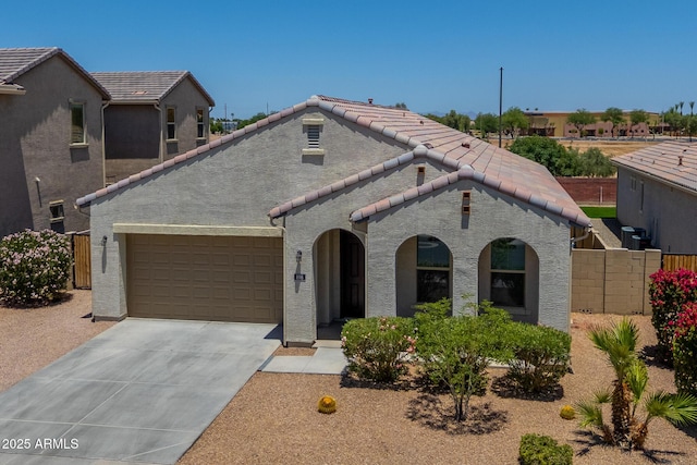 898 E Ladbroke Way, Gilbert, AZ 85297 - view of front of home featuring a tile roof, an attached garage, stucco siding, and driveway