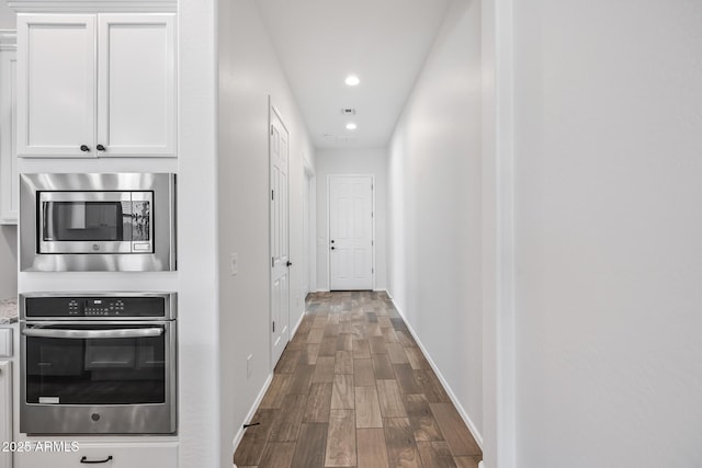 898 E Ladbroke Way, Gilbert, AZ 85297 - corridor with recessed lighting, wood finished floors, and baseboards