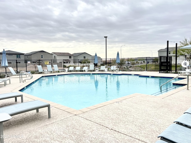 view of swimming pool featuring a patio