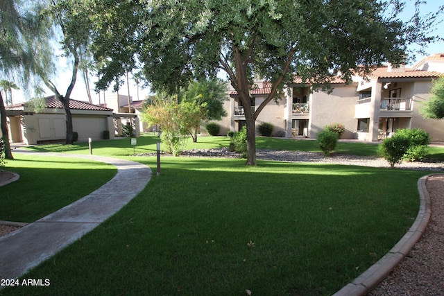 9450 N 95th St Unit 219, Scottsdale, AZ 85258 - view of property's community with a lawn