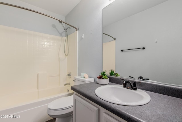 bathroom featuring shower / bathtub combination, toilet, and vanity