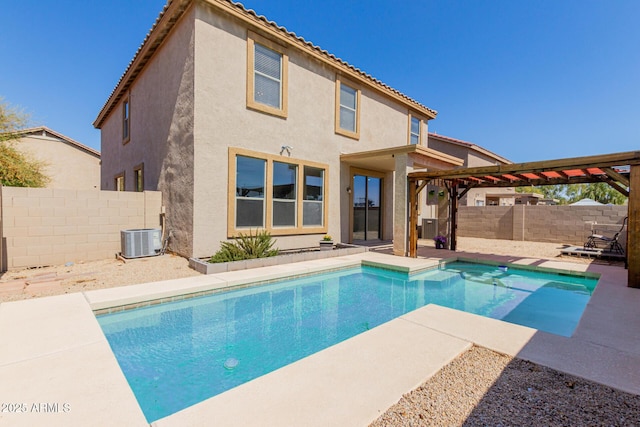 view of swimming pool with a pergola, a patio, a fenced backyard, cooling unit, and a fenced in pool