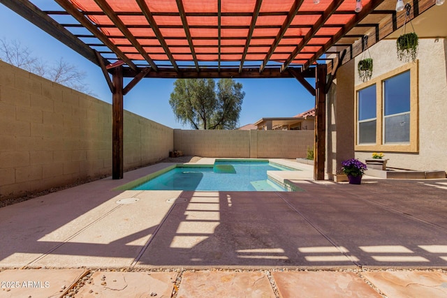 view of swimming pool featuring a fenced in pool, a patio, a fenced backyard, and a pergola