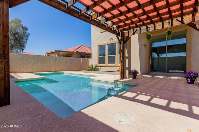 view of pool featuring a patio area, a fenced in pool, fence, and a pergola