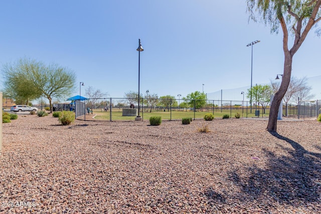 view of play area featuring fence