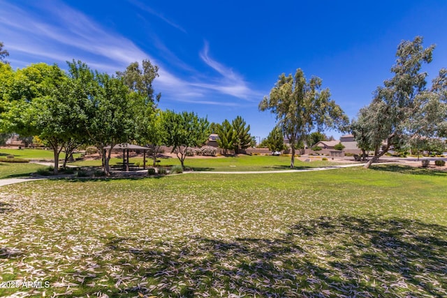 view of home's community with a gazebo and a lawn