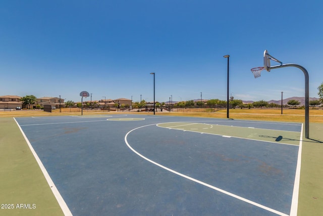 view of basketball court featuring community basketball court