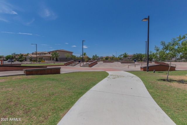 surrounding community featuring a lawn