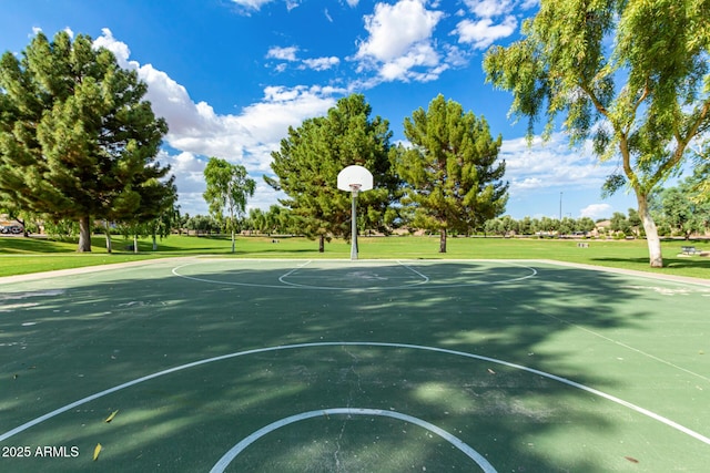 view of sport court with community basketball court and a lawn