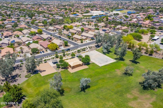 birds eye view of property with a residential view